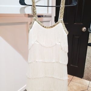 White with gold tassle dress